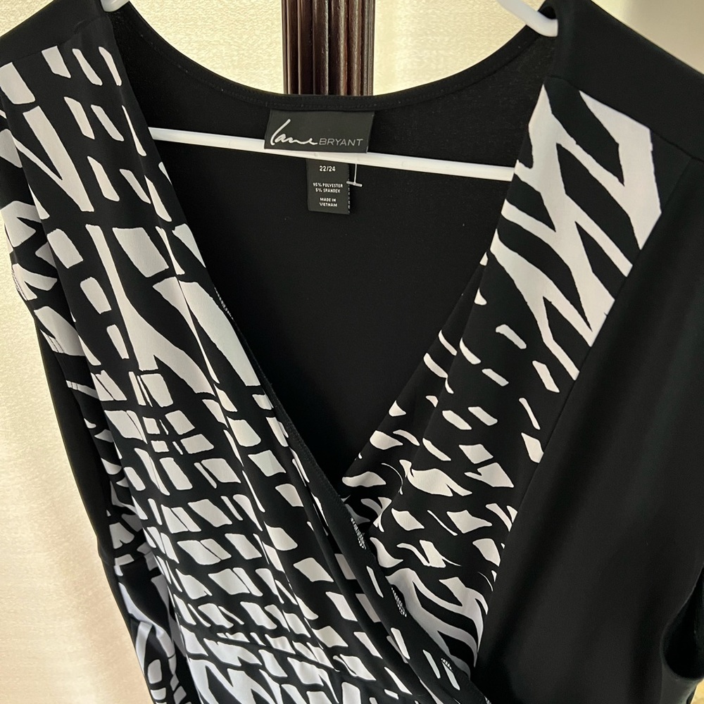 Layne Bryant: Black and White Faux Wrap Dress. Sleeveless.